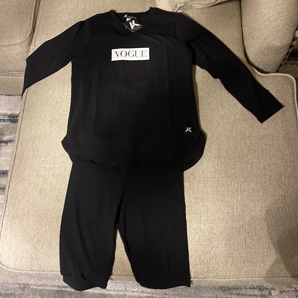 Two piece black, “AMERICAN KIDS: VOUGE” set. XL shirt + XL shorts.